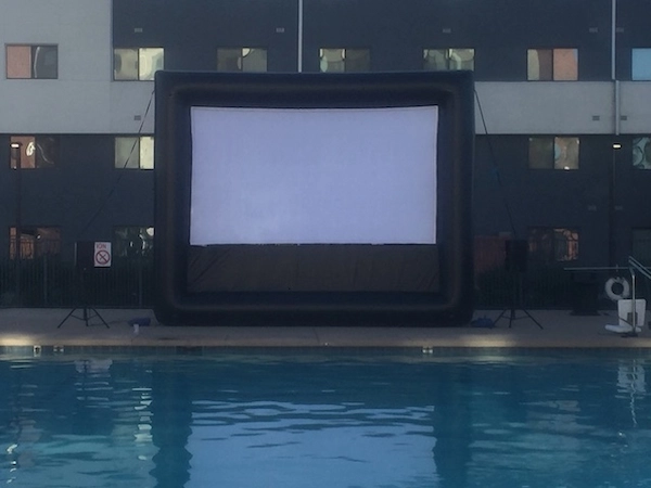 Community outdoor movie with large screen
