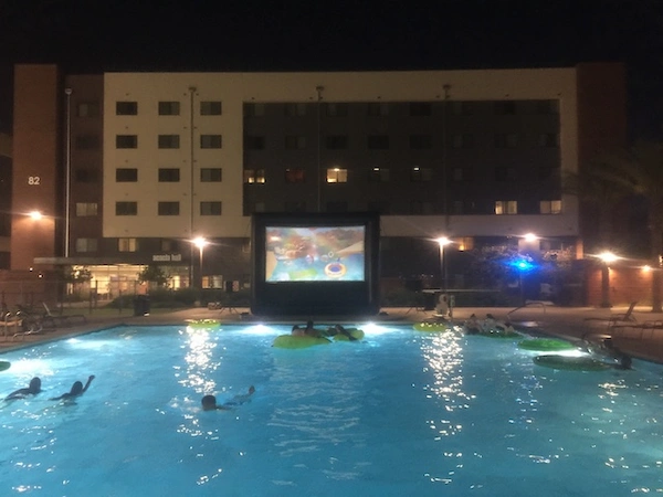 Outdoor cinema setup with HD projector